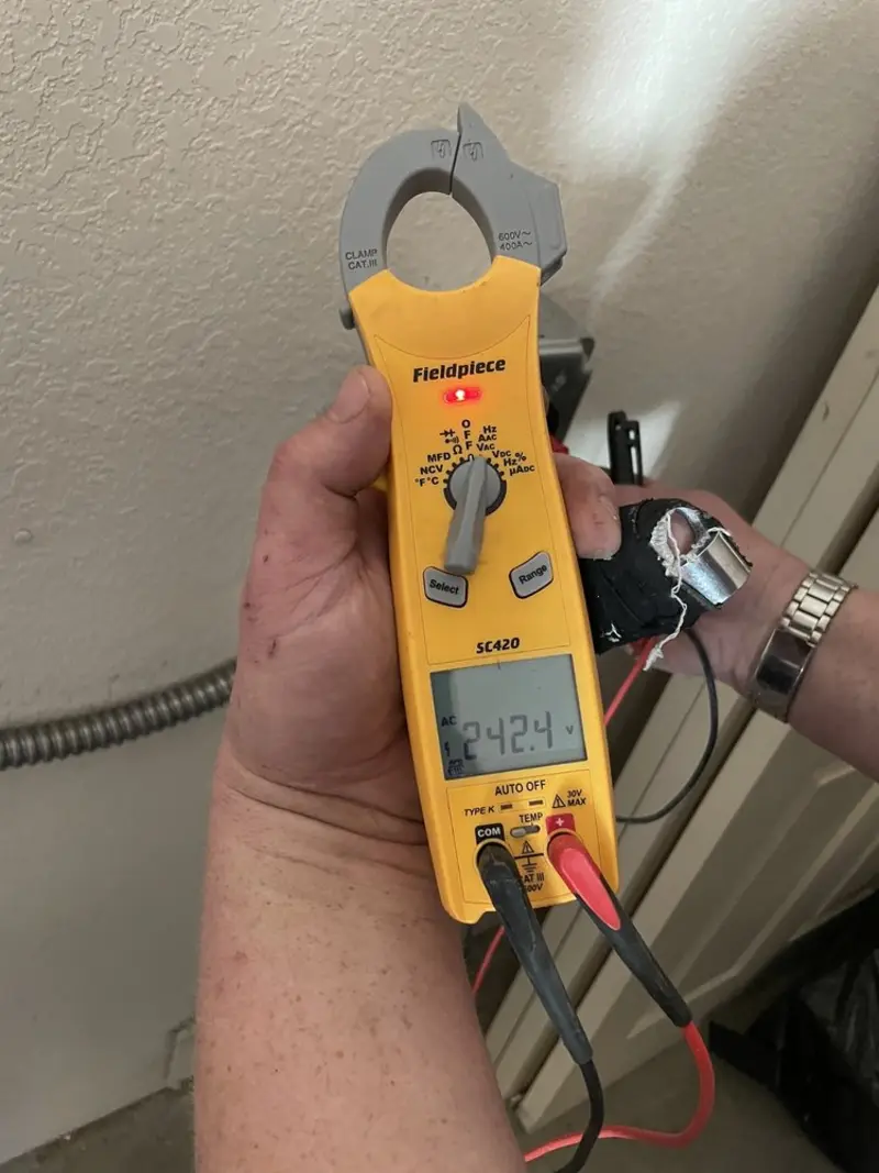 Voltage testing with clamp meter during Electrical Installation Services in Ridgecrest